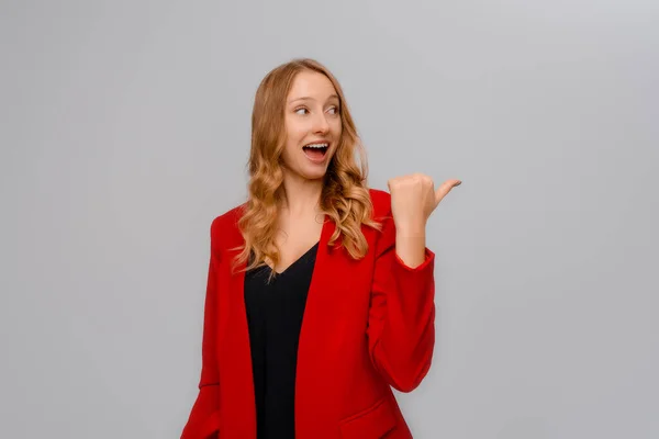 Hey Look Smiling Excited Blonde Young Woman Pointing Finger Right — Stockfoto