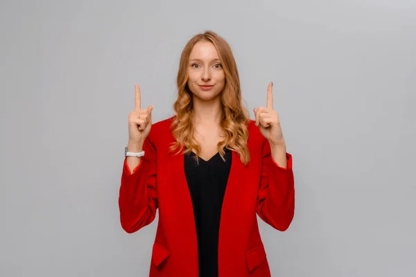 Portrait Smiling Blonde Young Woman Pointing Fingers Showing Big Promo — Stockfoto