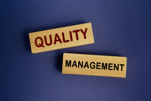 Words Quality Management Written Wooden Blocks Dark Blue Background Business — Stock Photo, Image