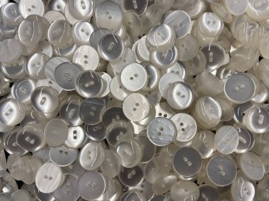 Giysiler için düğmeler. Yedek kıyafet düğmeleri koleksiyonu. Düğme dikiyorum. Düğme arkaplanı.