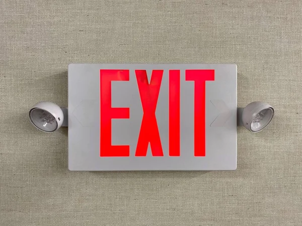 Exit emergency sign. Fire exit. Rescue red led light. Modern fire security diversity. Red fire escape sign hang.
