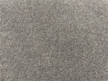 Gri örülmüş yün doku arka planı. Kaba örgü ya da kumaşın arka planı. Örgü desenli arkaplan.