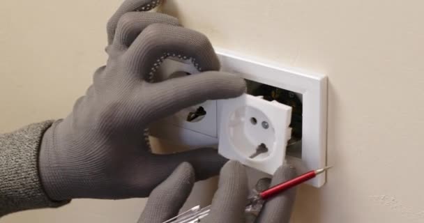 Hands Electrician Gloves Repair White Socket Installed Beige Wall Room — Wideo stockowe