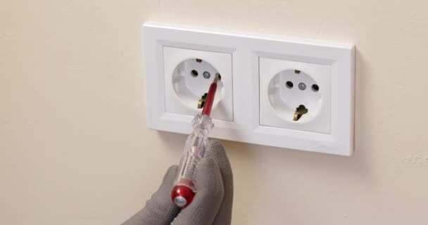 Electrician Uses Indicator Control Voltage White Socket Installed Beige Wall — Wideo stockowe