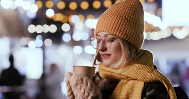 Blonde Woman Enjoys Hot Steaming Tea Paper Cup Getting Warm — Video