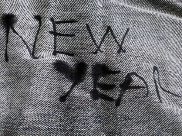 Neujahrsschreiben Mit Tinte Auf Dem Jean — Stockfoto