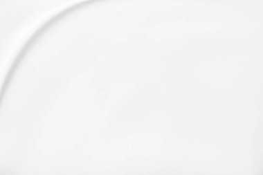 Yumuşak dalga dokusu arka planına sahip soyut beyaz kumaş