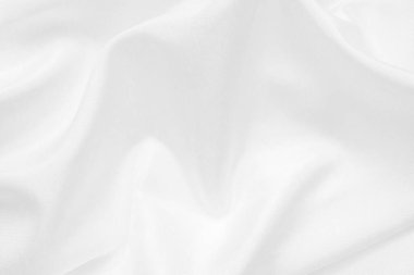 Yumuşak dalga dokusu arka planına sahip soyut beyaz kumaş