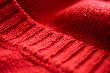 Kapalı kırmızı örgü yün kumaş dokusu arkaplanı