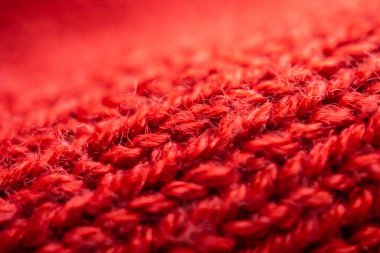 Kapalı kırmızı örgü yün kumaş dokusu arkaplanı