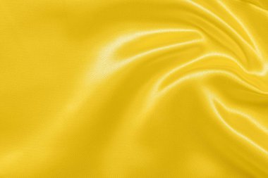 Yumuşak dalga dokusu arka planına sahip soyut lüks altın kumaş