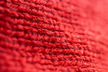 Kapalı kırmızı örgü yün kumaş dokusu arkaplanı
