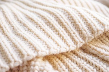 Kapat bej örgü yün kumaş dokusu arkaplanı