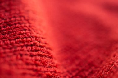 Kapalı kırmızı örgü yün kumaş dokusu arkaplanı