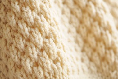 Kapat bej örgü yün kumaş dokusu arkaplanı