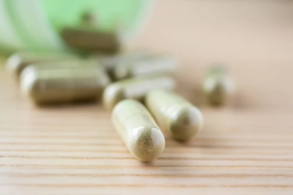 Herbal Medicine Capsules Bottle Wood Table — Stock Photo, Image