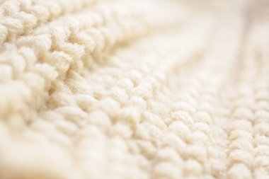 Kapat bej örgü yün kumaş dokusu arkaplanı