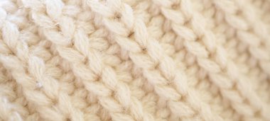 Kapat bej örgü yün kumaş dokusu arkaplanı