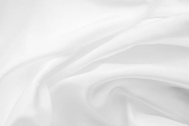 Yumuşak dalga dokusu arka planına sahip soyut beyaz kumaş