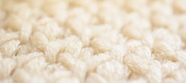 Kapat bej örgü yün kumaş dokusu arkaplanı