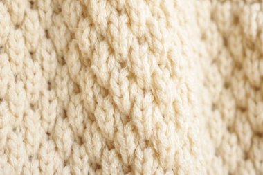 Kapat bej örgü yün kumaş dokusu arkaplanı