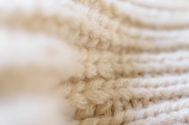 Kapat bej örgü yün kumaş dokusu arkaplanı