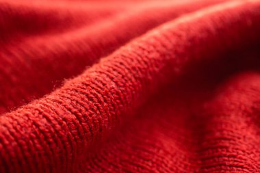 Kapalı kırmızı örgü yün kumaş dokusu arkaplanı