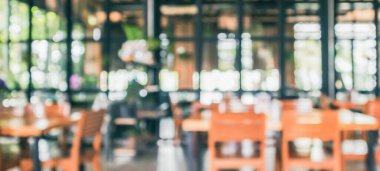 Kafe restoranının içi soyut vintage arka planı bulanıklaştırılmış