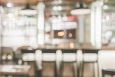 Kafe restoranının içi soyut vintage arka planı bulanıklaştırılmış