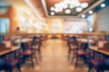Kafe restoranının içi soyut vintage arka planı bulanıklaştırılmış