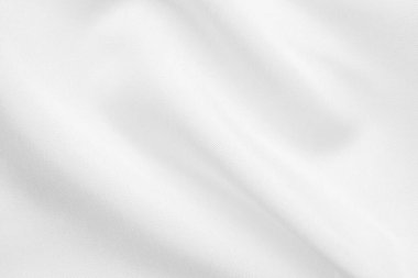 Yumuşak dalga dokusu arka planına sahip soyut beyaz kumaş