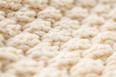 Kapat bej örgü yün kumaş dokusu arkaplanı