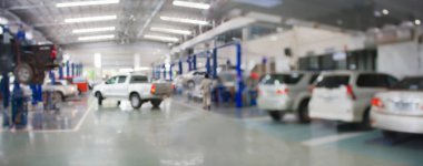 Araç servis merkezi oto tamir atölyesi bulanık panoramik arkaplan