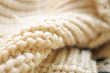 Kapat bej örgü yün kumaş dokusu arkaplanı