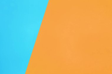 mavi ve turuncu pastel kağıt rengi üst görünüm minimal düz arkaplan