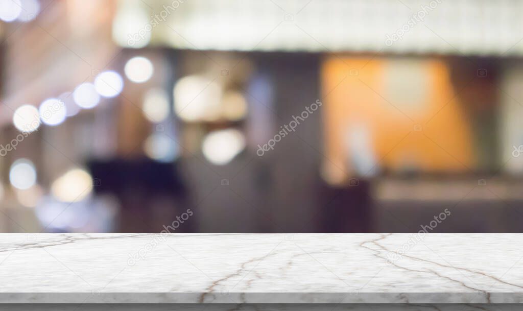 marble table top with blurred kitchen cafe restaurant interior background