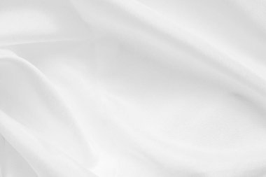 Yumuşak dalga dokusu arka planına sahip soyut beyaz kumaş