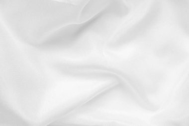 Yumuşak dalga dokusu arka planına sahip soyut beyaz kumaş