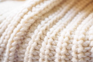 Kapat bej örgü yün kumaş dokusu arkaplanı