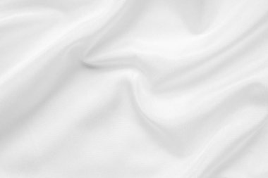 Yumuşak dalga dokusu arka planına sahip soyut beyaz kumaş