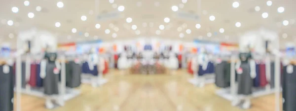 アブストラクトブラー服ブティックディスプレイショッピングモールの背景のインテリア — ストック写真