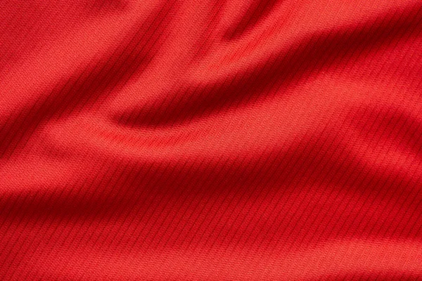 红色运动服面料足球球衣纹理特写 — 图库照片