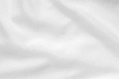 Yumuşak dalga dokusu arka planına sahip soyut beyaz kumaş