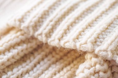 Kapat bej örgü yün kumaş dokusu arkaplanı