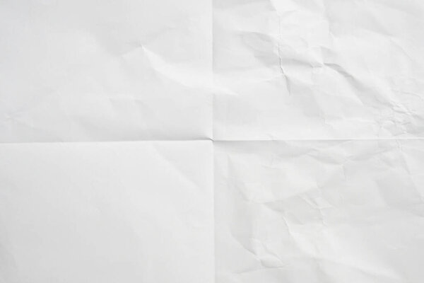 White folded and wrinkled paper texture background