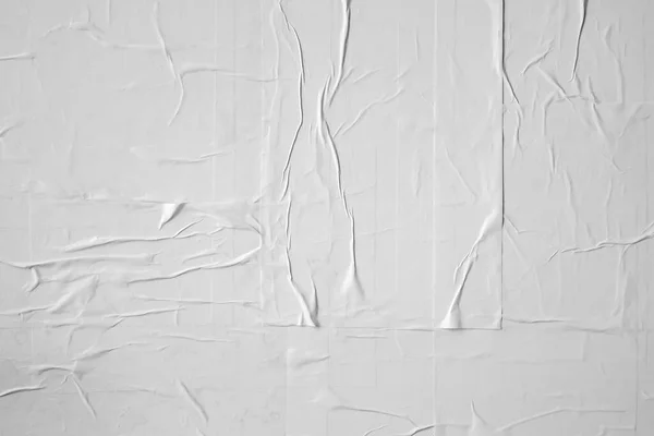 white crumpled and creased paper poster texture background