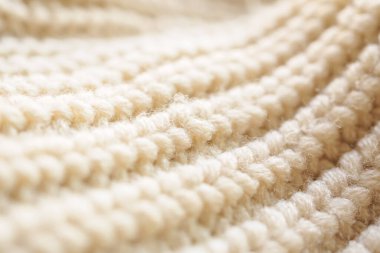 Kapat bej örgü yün kumaş dokusu arkaplanı