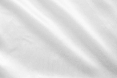 Yumuşak dalga dokusu arka planına sahip soyut beyaz kumaş