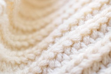 Kapat bej örgü yün kumaş dokusu arkaplanı