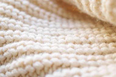Kapat bej örgü yün kumaş dokusu arkaplanı